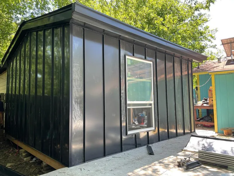 Black standing seam metal wall panels for Roof Inspection in Mamaroneck