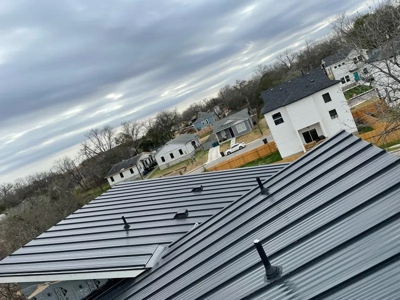 Standing seam metal roof panels with vents for Skylight Repair in Mamaroneck